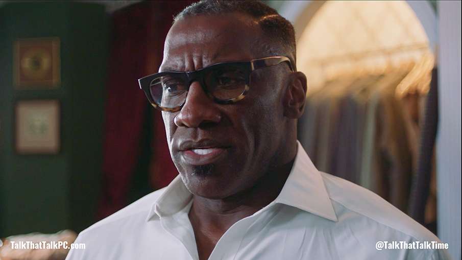 Image of Shannon Sharpe in a white shirt